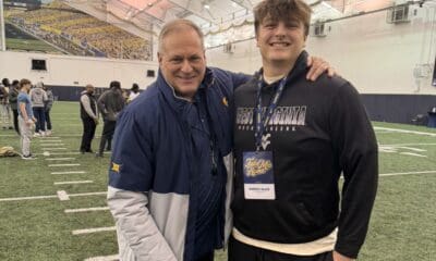 WVU Football HC Rich Rodriguez with OL recruit Dominic Black