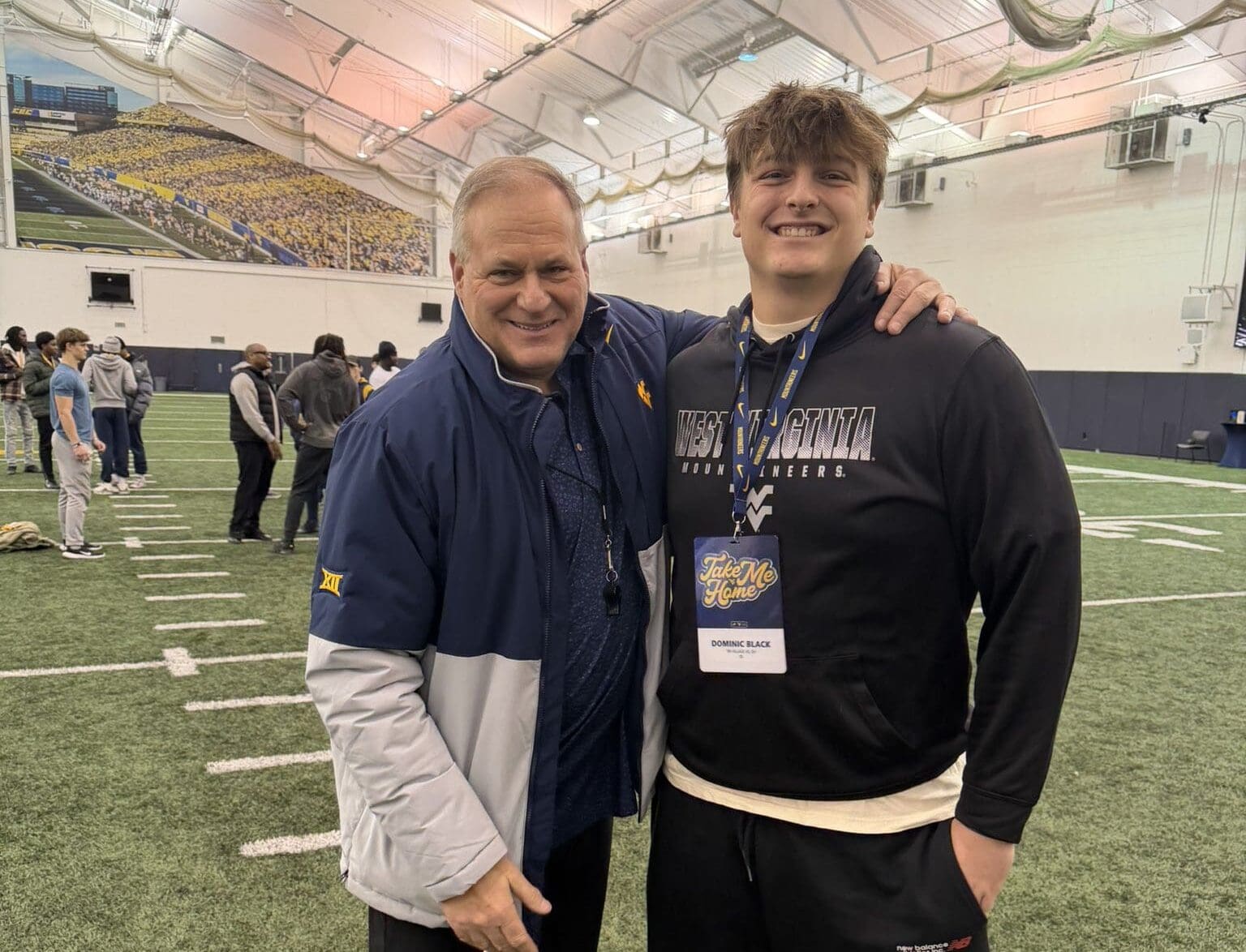 WVU Football HC Rich Rodriguez with OL recruit Dominic Black