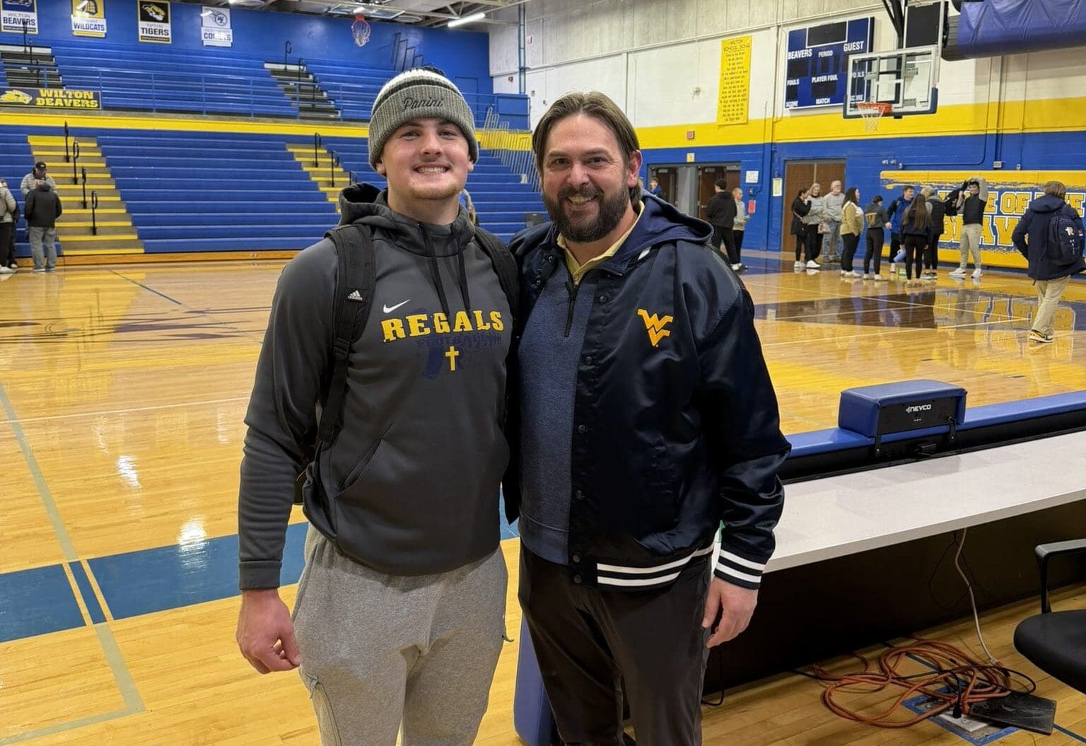 WVU Football LB recruit Tate Wallace and coach Andrew Warwick
