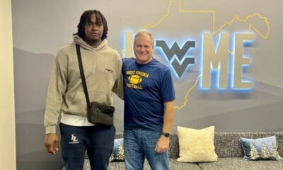 WVU Football OL Jonas Muya and Rich Rodriguez