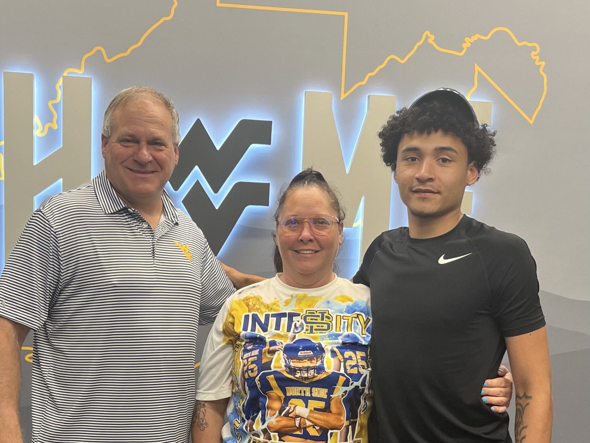 WVU Football recruit Javonte Smith and Rich Rodruguez