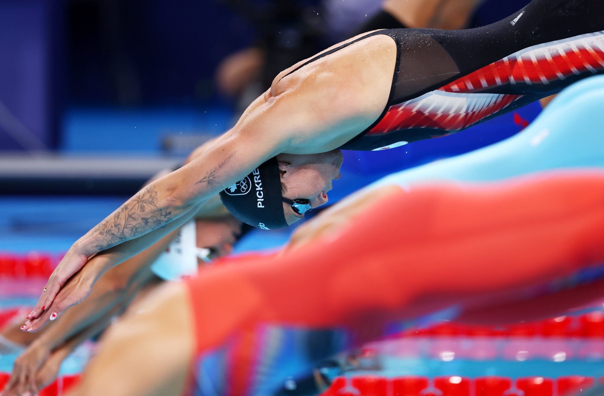 WVU Swim Coach Sydney Pickrem at Olympics