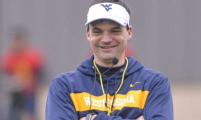 WVU Football HC Neal Brown smiling